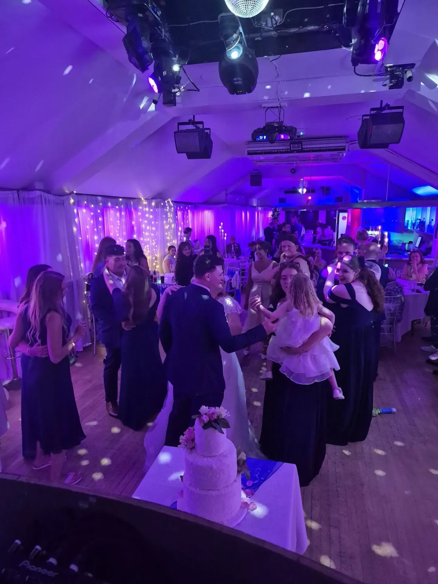 First dance under the lights at a wedding
