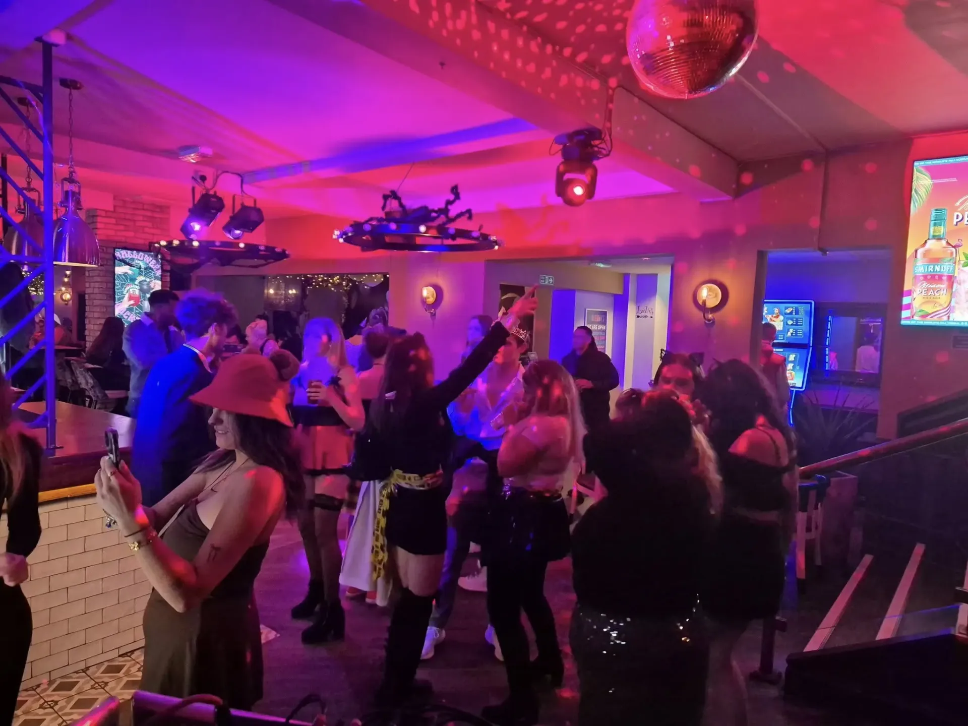 Halloween party with disco ball and mood lighting